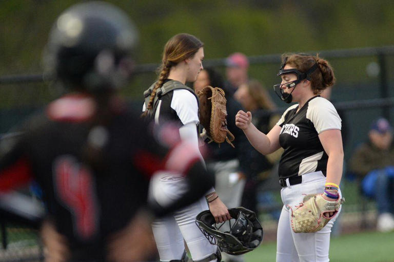 Point Pleasant Boro pitcher Dakota Palmieri (8) meets with catcher Georgia Tym (21) during the Ocean County softball tournament final against Jackson at Adventure Sports in Jackson, Wednesday, May 3, 2023. May 3, 2023.