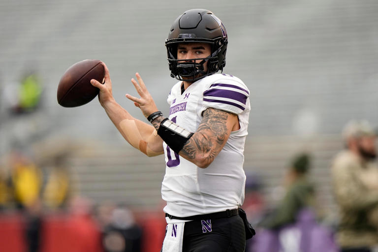 Nov 11, 2023; Madison, Wisconsin, USA; Northwestern Wildcats quarterback Brendan Sullivan (6) throws a pass during warmups prior to the game against the Wisconsin Badgers at Camp Randall Stadium. Mandatory Credit: Jeff Hanisch-USA TODAY Sports