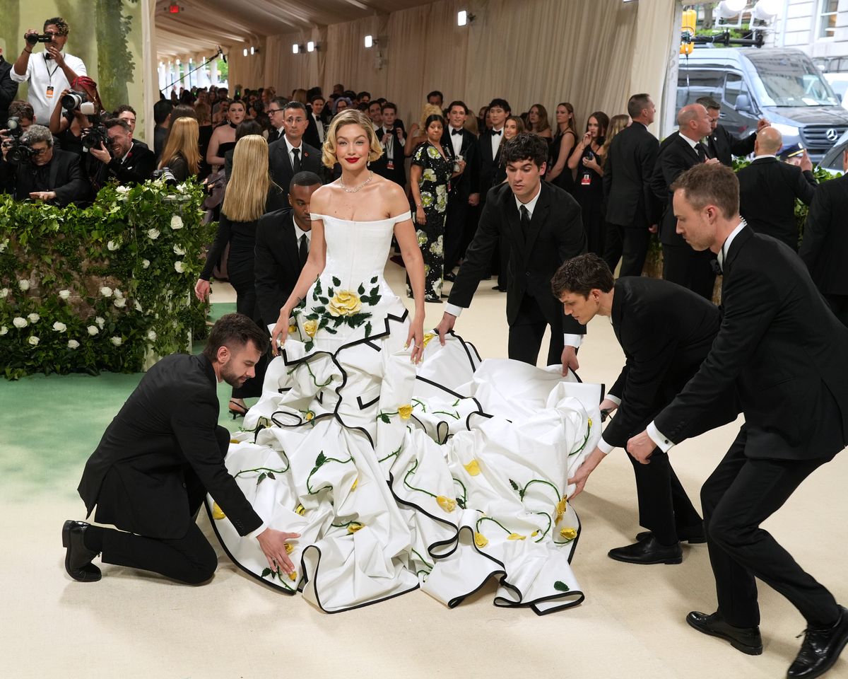 gigi hadid's 2024 met gala gown had to be carried up the red carpet