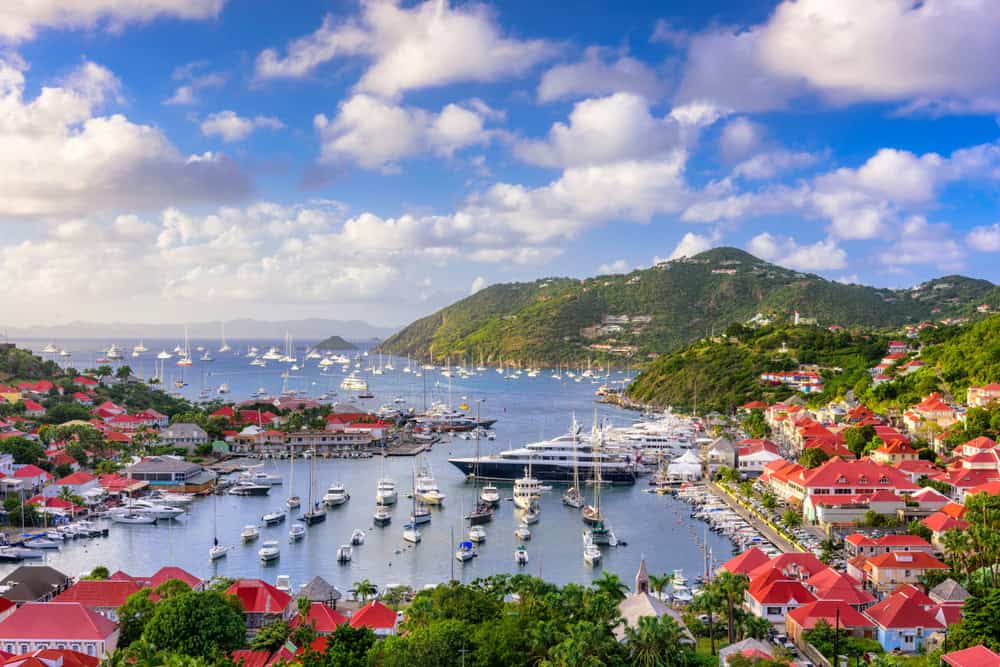 <p>St. Barts is renowned for its chic ambiance, attracting jet-setters and celebrities to its luxurious resorts and designer boutiques. However, this luxury comes at a price, with estimated expenses ranging from $500 to $1,000+ per day per person. The island’s pristine white-sand beaches and crystal-clear turquoise waters offer ideal conditions for snorkeling and diving among vibrant coral reefs. Its French-Caribbean fusion cuisine is a gastronomic delight, with gourmet restaurants serving fresh seafood and exquisite wines. The charming capital of Gustavia boasts charming colonial architecture, upscale shops, and a bustling harbor filled with luxury yachts.</p>