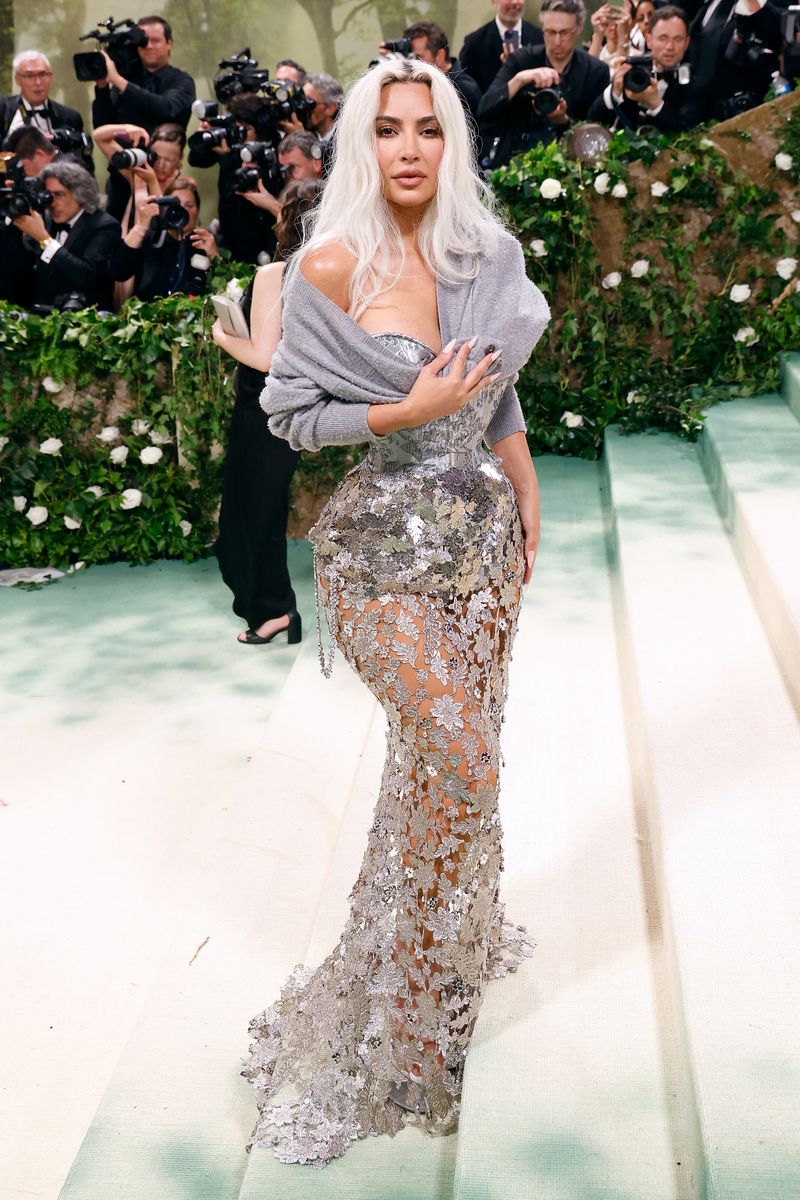 kim kardashian explains why she wore a cardigan with her sheer corset gown to the met gala