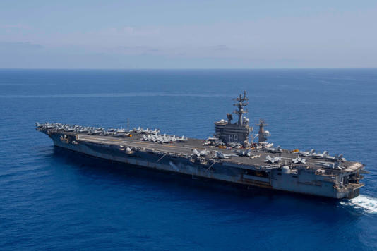 A US Navy aircraft carrier is rearmed and back in the Red Sea amid a ...