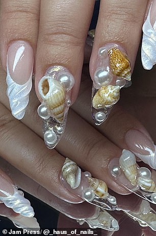 nail technician, 24, makes a cup of tea using only her acrylics