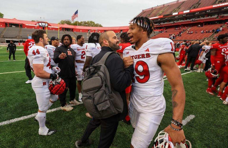 Rutgers defensive coordinator Joe Harasymiak (left) has a moment with defensive back Davoun Fuse (19) after the Rutgers football Scarlet-White spring game, Saturday, April 27, 2024, in Piscataway, N.J.
