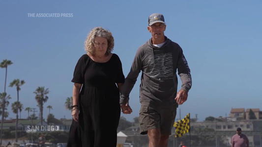 The mother of killed Australian surfers gives a moving tribute to her sons at a beach in San Diego<br><br>