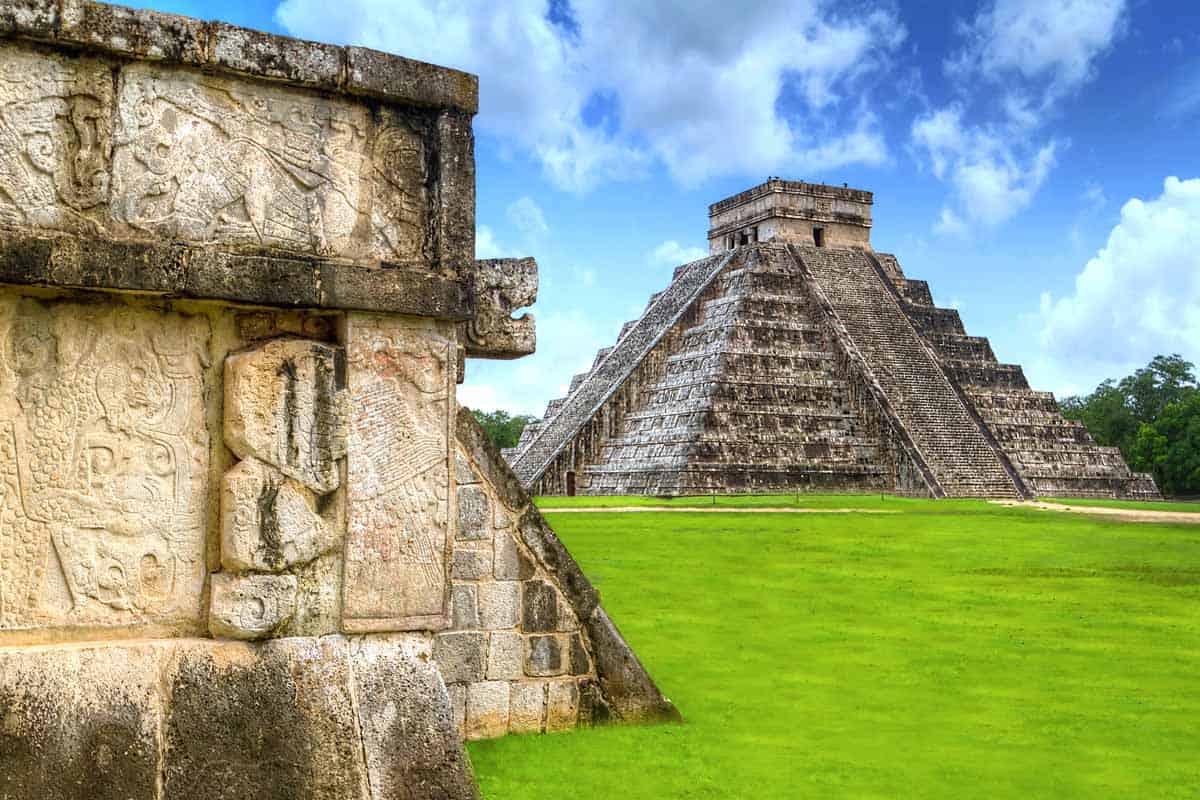 <p>Chichen Itza was once one of the largest Maya cities during its time and is now one of the most visited archaeological sites in the world. <a href="https://www.chichenitza.com/" rel="nofollow noopener">Chichen Itza</a>, meaning “at the mouth of the well at the Itza,” had four cenotes, or wells, that provided water to the city and its people.</p><p>It is a two-and-a-half-hour drive from Cancun with many guided tours, where you can learn from local experts and historians about the Mayan culture and the history of this city.</p><p>El Castillo, the largest pyramid in Chichen Itza, is the castle for <a href="https://en.wikipedia.org/wiki/Kukulkan#:~:text=K'uk'ulkan%2C%20also,to%20Quetzalcoatl%20of%20Aztec%20mythology." rel="nofollow noopener">Kukulcan</a>, the feathered serpent god of the Mayan people. During the spring and fall equinoxes, light and shadow create an effect along the steps of the pyramid, known as the <a href="https://mayanpeninsula.com/chichen-itza-equinox/" rel="nofollow noopener">Descent of the Serpent</a>. Thousands of visitors flock to Chichen Itza to witness the magical illusion of the snake slithering down the stairway. </p>