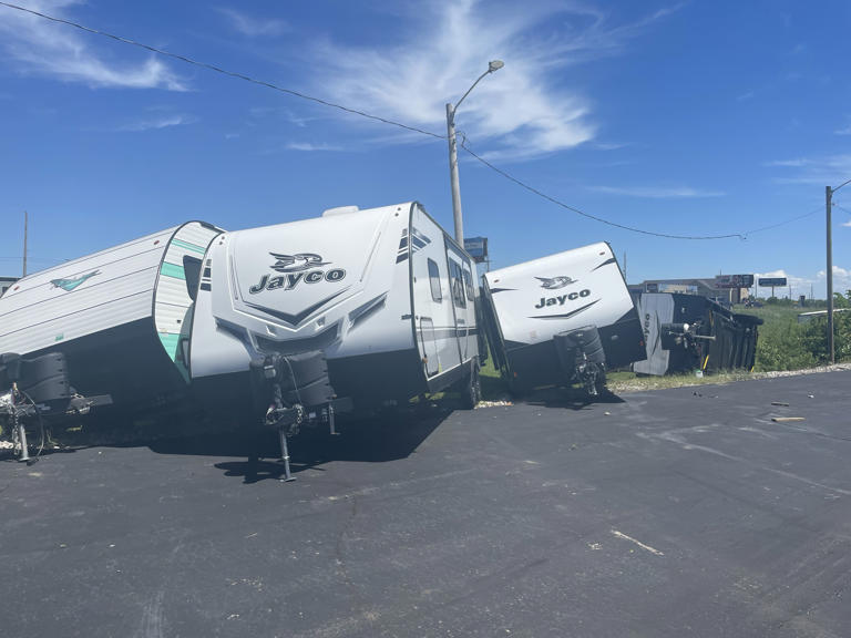 Turned over RVs, roof damage & scattered debris found following storm ...