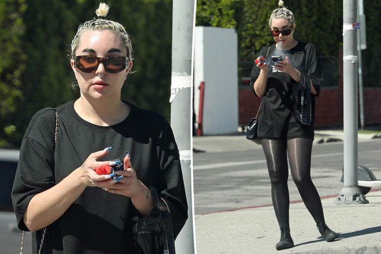 Amanda Bynes amuses herself with her phone, smokes vape during rare solo outing in LA