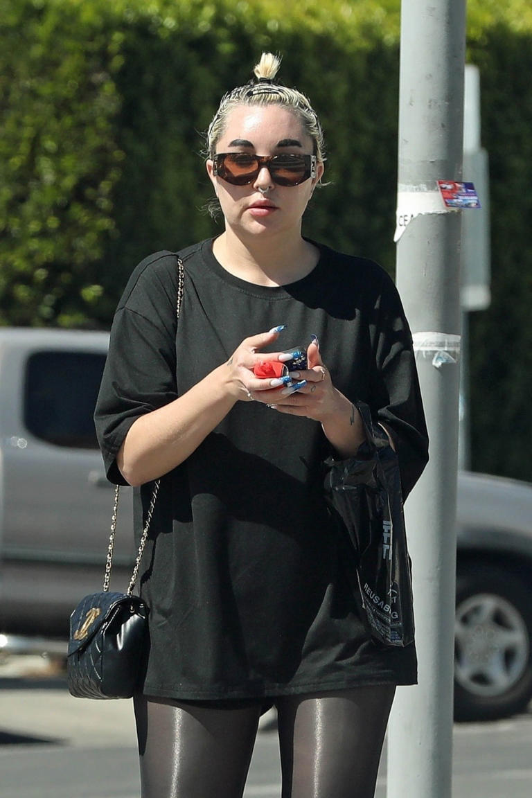 Amanda Bynes held onto her phone and vape as she stepped out in a rare LA outing.