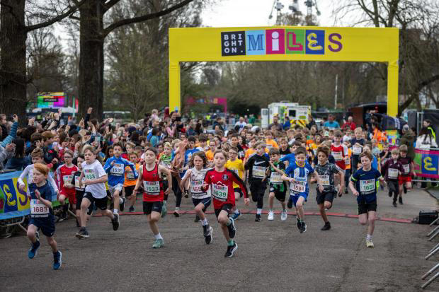 Adults, children, and a dog take part in first ever Brighton Miles race