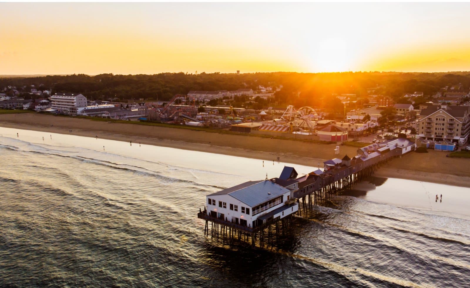 <p class="wp-caption-text">Image Credit: Shutterstock / Mircea Costina</p>  <p>Bask in the sun at Old Orchard Beach, home to a historic pier, amusement park, and 7 miles of sandy beach. It’s a family-friendly destination with a lively boardwalk and affordable seaside accommodations.</p>
