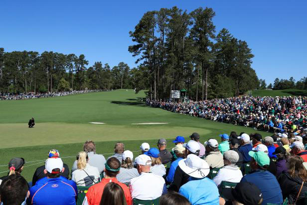 AUGUSTA, GA - APRIL 05: Tiger Woods of the United States lines up a putt on the second green as a gallery of patrons look on during the first round of the 2018 Masters Tournament at Augusta National Golf Club on April 5, 2018 in Augusta, Georgia. (Photo by Andrew Redington/Getty Images)