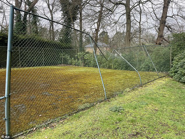 The tennis court- which is now covered in moss - was once immaculate 