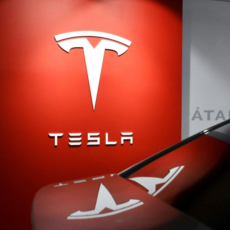 Unveiling the Mystery: The Story Behind Tesla's Logo