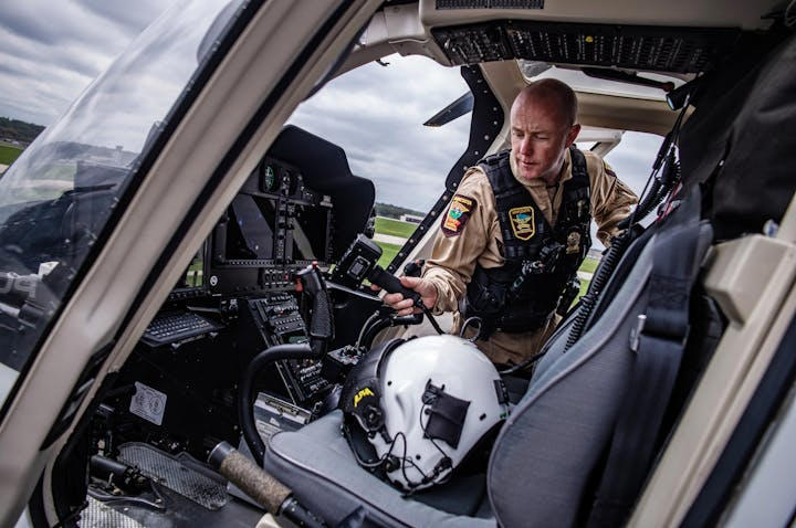Lt. Craig Benz, chief pilot with the Minnesota State Patrol flight section, will help with the future first responders summer camp at the Holman Field airport in downtown St. Paul.