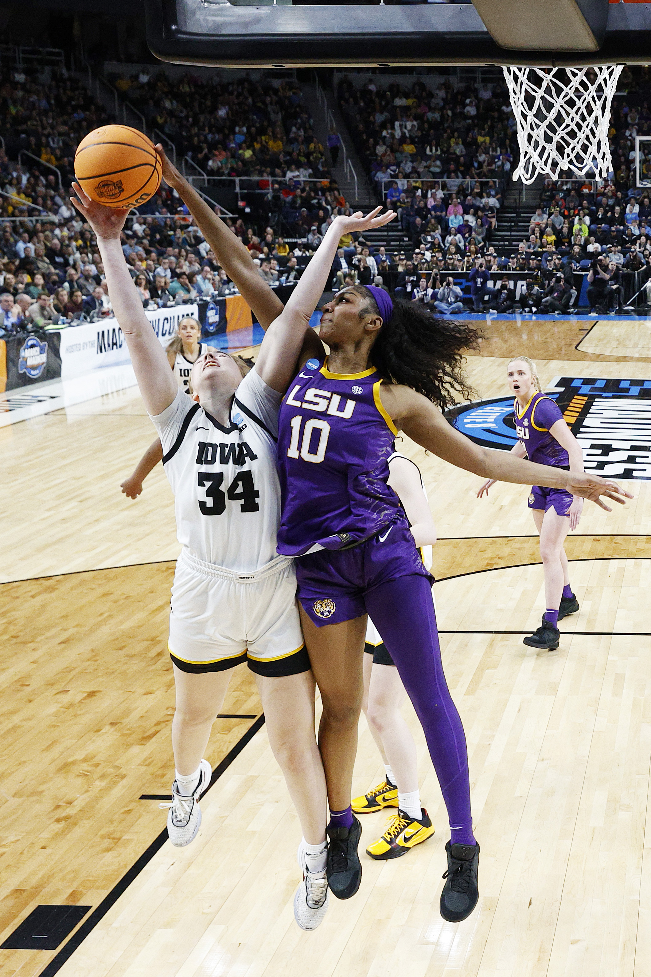 LSU's Angel Reese Shares Moving Moment With Iowa Rival Caitlin Clark ...