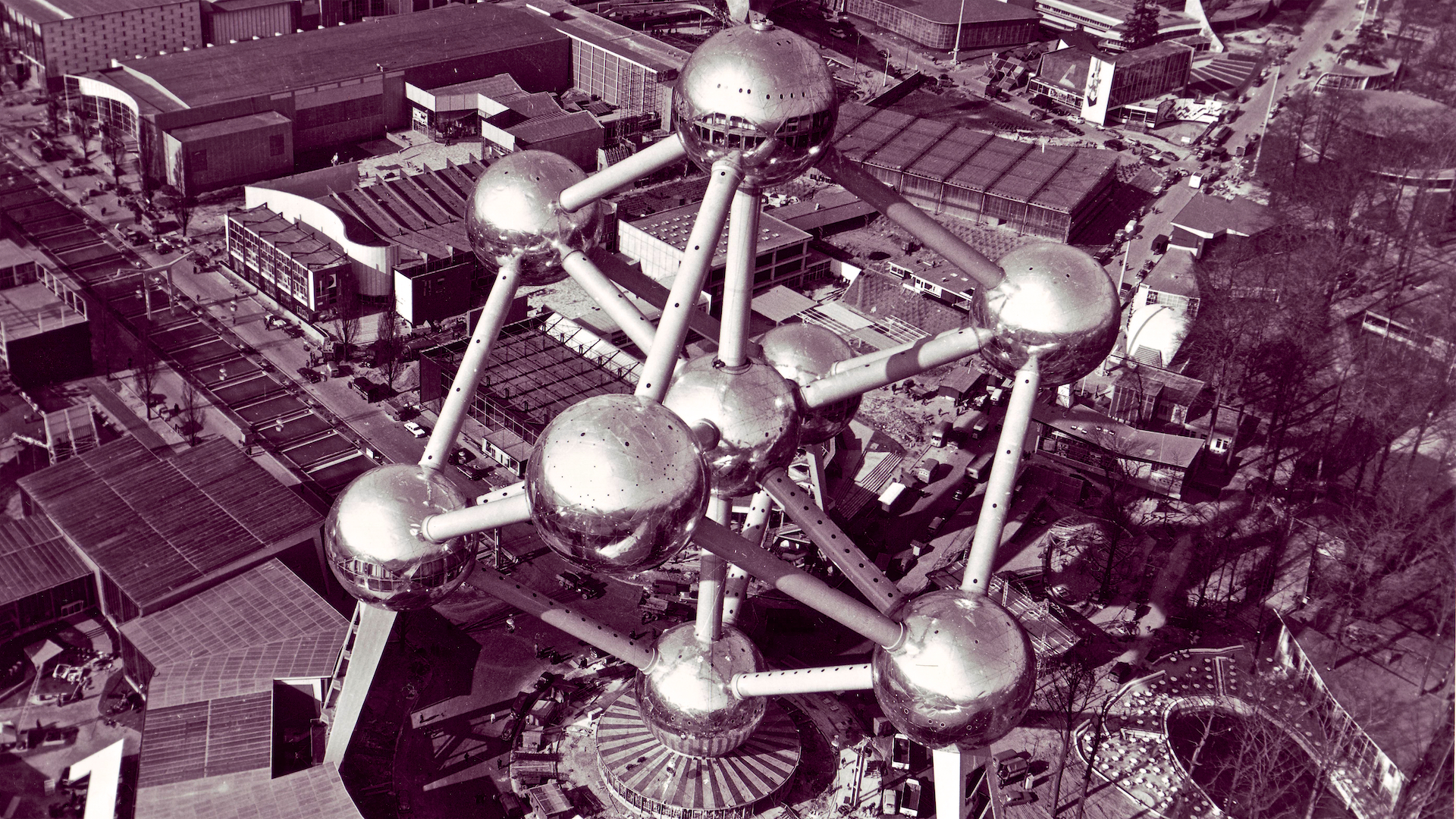 <p><span><span><span><span><span><span>The Atomium, in Brussels, Belgium, was designed by engineer André Waterkeyn and architects André and Jean Polak. Built for the 1958 Brussels World's Fair (Expo 58), the Atomium represented scientific progress, technological innovation, and the peaceful use of nuclear energy.</span></span></span></span></span></span></p>  <p><span><span><span><span><span><span>The Atomium featured nine interconnected spheres, each measuring 18 meters in diameter. The spheres were supposed to represent an iron crystal magnified 165 billion times. During Expo 58, the Atomium was a central attraction, offering visitors an immersive and educational experience. Its interior offered exhibitions on science, industry, and culture while its observation decks provided panoramic views of Brussels and the surrounding landscape.</span></span></span></span></span></span></p>  <p><span><span><span><span><span><span>Although the Atomium was originally intended as a temporary exhibit, the building still stands and continues to be a major tourist destination, attracting over half a million visitors annually. Visitors can see the exhibitions, including displays on the history of the Atomium and temporary art installations. The Atomium's observation decks are also popular, offering breathtaking views of Brussels.</span></span></span></span></span></span></p>