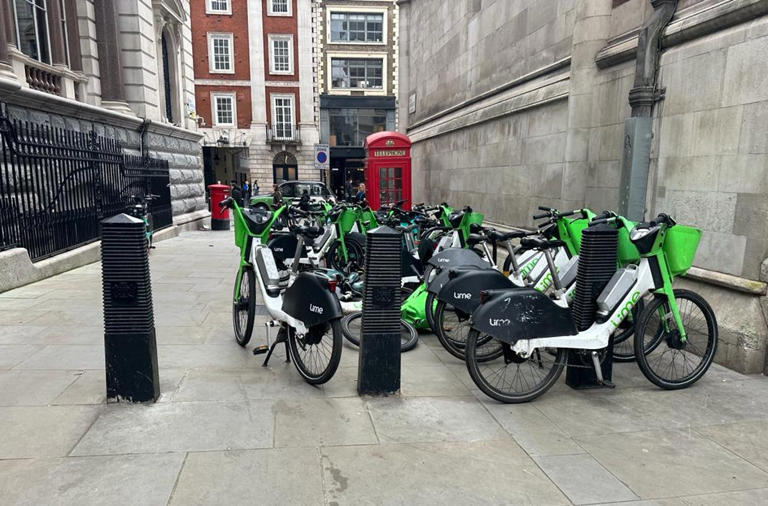 Lime bikes on London pavements