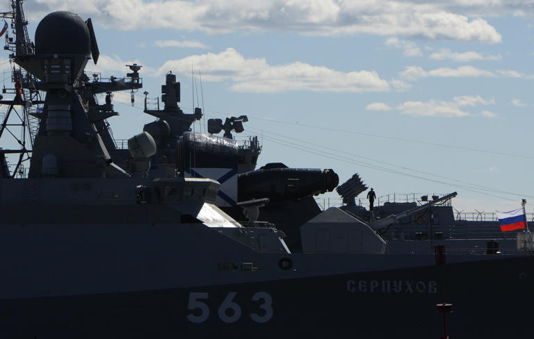A crew member stands on the deck of the Russian Navy's Buyan-class missile corvette Serpukhov during the International Maritime Defence Show in Saint Petersburg on June 28, 2017. On April 8, 2024, Ukrainian media reported that Serpukhov caught fire and was dealt "significant damage" in the Baltic Sea.