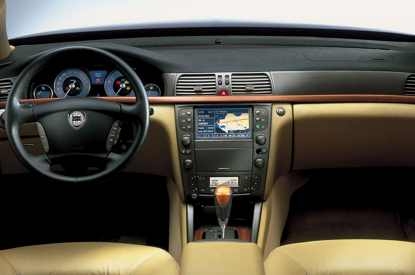 <p>Given that Lancia’s biggest barely registers on any sales graph featuring the 5 Series, E Class and A6, it might just as well have gone the whole way and produced something really different. Especially as the Thesis feels pretty special inside, despite the loss of the concept’s (admittedly impractical) wooden floor and smooth-contoured seating. Sparely deployed wood, cream-faced instruments and richly upholstered seats make this Lancia a car you want to get in as do the heated and cooled massage seats that can be optionally installed front and rear.</p>