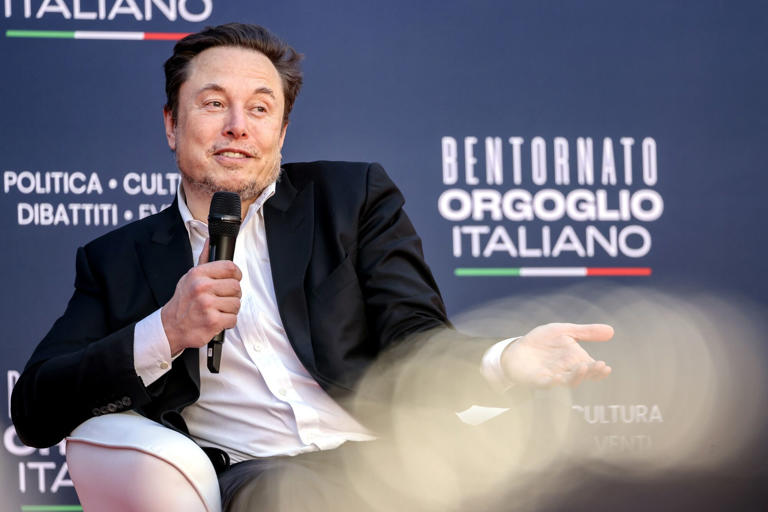 Elon Musk speaks at the Atreju convention in Rome.
