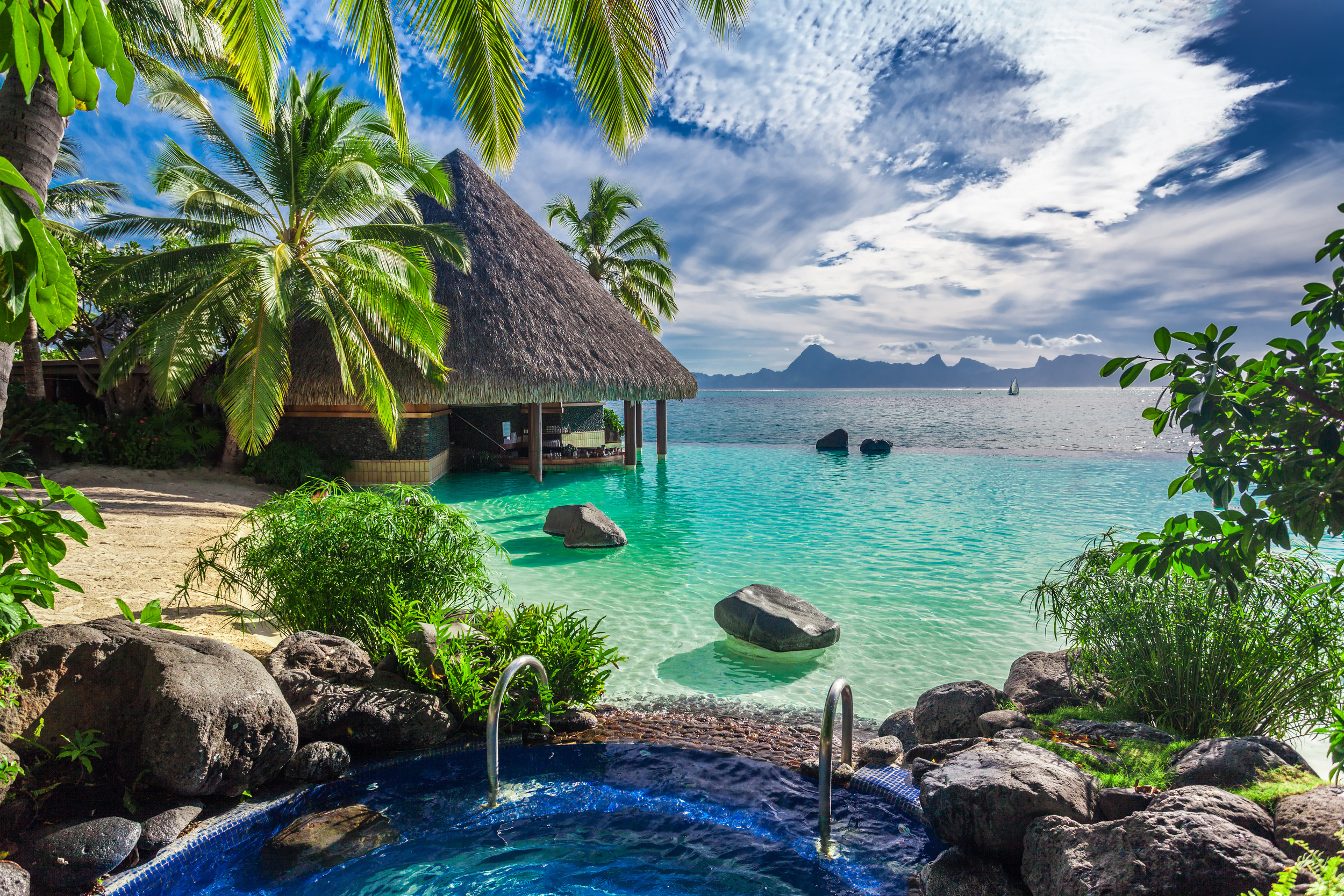<p>Tahiti is one of the world's great tropical locations. A playground for adventure seekers and a spa for nature lovers, the island is a destination for anyone who enjoys turquoise waters, soothing beaches, and incredibly lush jungles. You won't find any parties here, nor skyscrapers, just the serene sounds of nature. </p><p>There are enough natural activities to fill an entire calendar—and enough coconuts to feed an entire country. Beware of the fruit here; you can eat too much of it. So, what are the best things to do while exploring the island? We've rounded up the best Tahitian experiences, from the black sands to the choral reefs to the nearby islands, which offer their own slice of tropical paradise. Here is how you can visit Tahiti in style.</p>