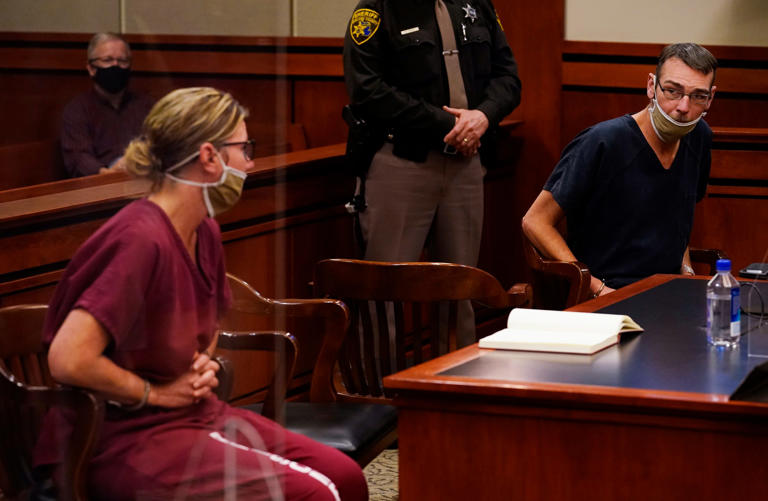 Jennifer and James Crumbley, the parents of the Oxford High School gunman, in court together on Dec. 14, 2021, before their cases were separated for trial on involuntary manslaughter charges.