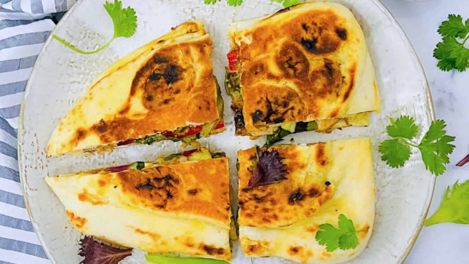 <p>Now, that's a fun twist on Indian cuisine - a Chicken Tikka Naanwich! It packs all the flavors of delightful chicken tikka but in a lunch-friendly naan. It's one of those underrated Indian dishes that will absolutely change your sandwich game.<br><strong>Get the Recipe: </strong><a href="https://easyindiancookbook.com/chicken-tikka-naanwich-naan-sandwich/?utm_source=msn&utm_medium=page&utm_campaign=msn">Chicken Tikka Naanwich</a></p>