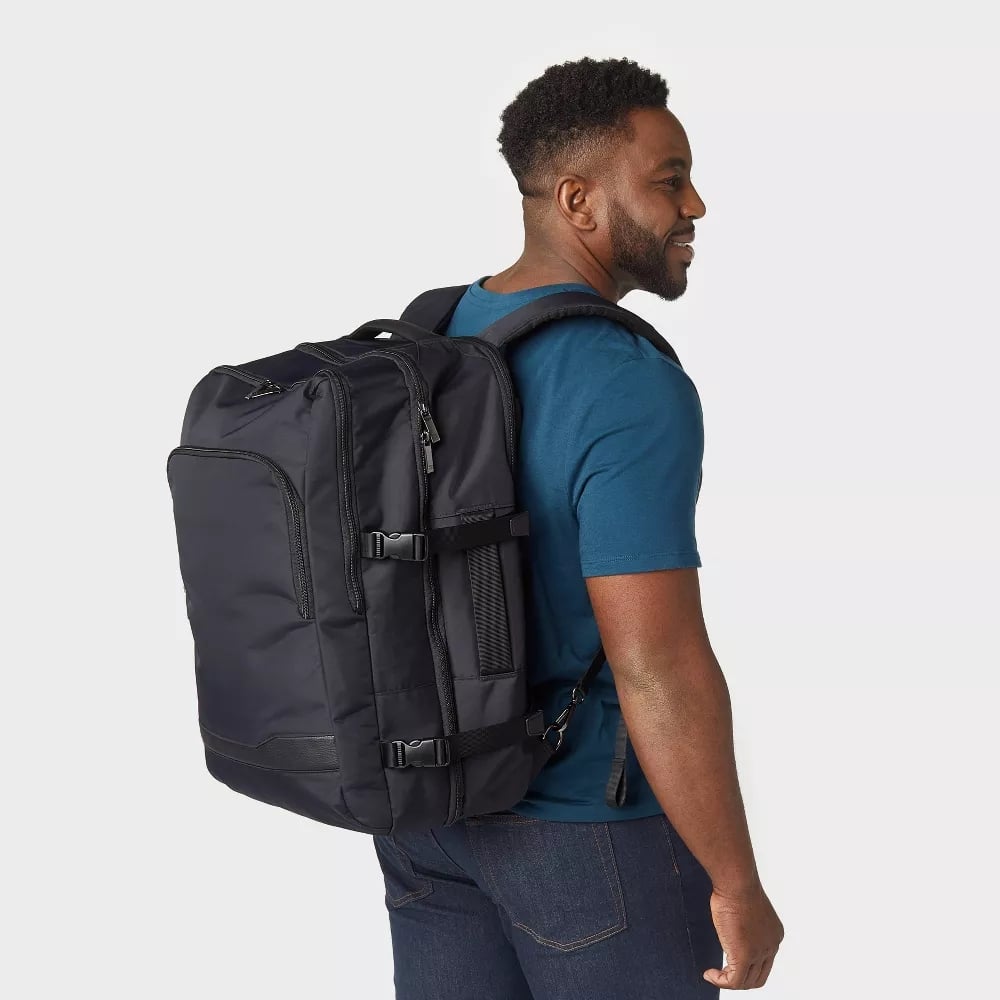<p><a href="https://www.target.com/p/signature-traveler-backpack-black-open-story-8482/-/A-77377084">BUY NOW</a></p><p>$120</p><p><a href="https://www.target.com/p/signature-traveler-backpack-black-open-story-8482/-/A-77377084" class="ga-track"><strong>Open Story Signature Traveler Backpack</strong></a> ($120)</p> <p>The Open Story Signature Traveler Backpack from Target looks and acts like a backpack from the outside, but functions like a suitcase internally. It has a zip-open, flat-lay design that opens up like a carry-on, so you can pack everything neatly. The backpack has three mesh compartments for organizing your clothes, a laptop compartment that's padded, and plenty of additional pockets to store all your other necessities. This is perfect for anyone who wants more balanced support for their back and shoulders, rather than relying on a crossbody or top handle design. It also has a useful trolley strap that doubles as an external pocket when not in use. It's made with a durable, water-resistant fabric as well. </p> <p><strong>Dimensions:</strong> 21" height x 14" width x 8.75" depth.</p>