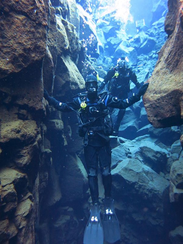 <p>Most people have learned about the tectonic plates while in school. Not too many people, however, have had the opportunity to stand between two tectonic plates. This experience is offered by the Silfra fissure in Iceland.</p> <p>Divers that swim down have the opportunity to stand between the American and Eurasian continental plates. In addition to the plates, tourists can also catch stunning views in the almost impossibly clear water.</p>