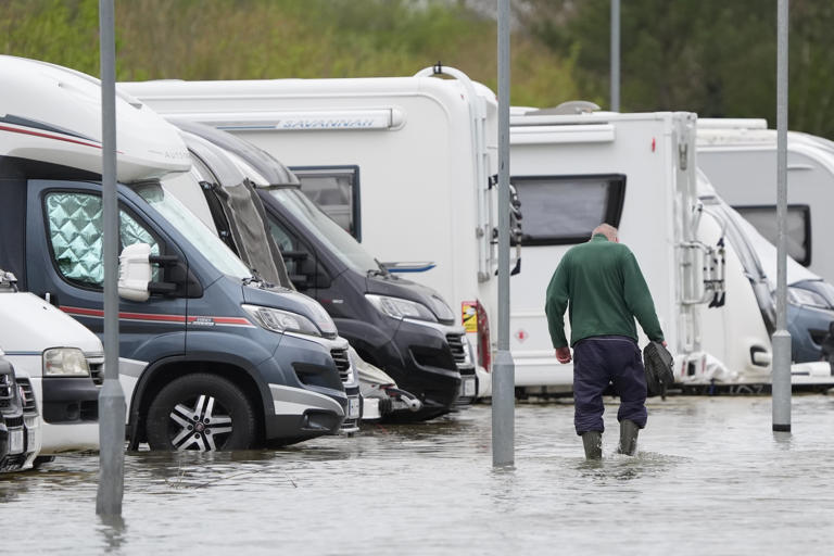 Torrential downpours and 65mph winds cause flooding chaos