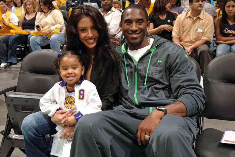 Andrew D. Bernstein/NBAE via Getty Kobe Bryant with his wife Vanessa and child Natalia watch the Los Angeles Sparks play the Sacramento Monarchs on August 16, 2005