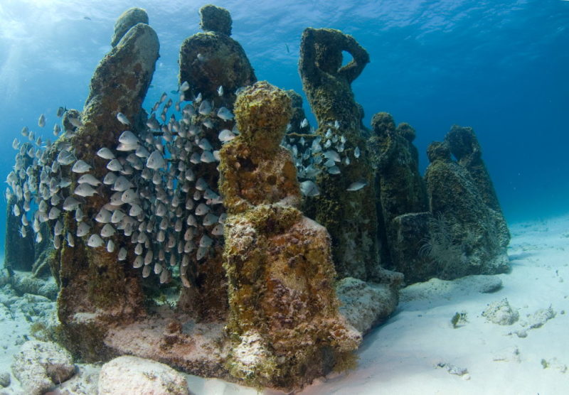 <p>While many popular underwater sights are naturally occurring, the underwater museum in Cancun, Mexico was manmade. The installation features 400 lifelike statues built beneath the sea.</p> <p>There are two reasons for the project. One is to draw more tourism to the region. The second is an effort to create an artificial coral reef. If you're into eco-tourism this is a great trip to add onto your bucket list.</p>