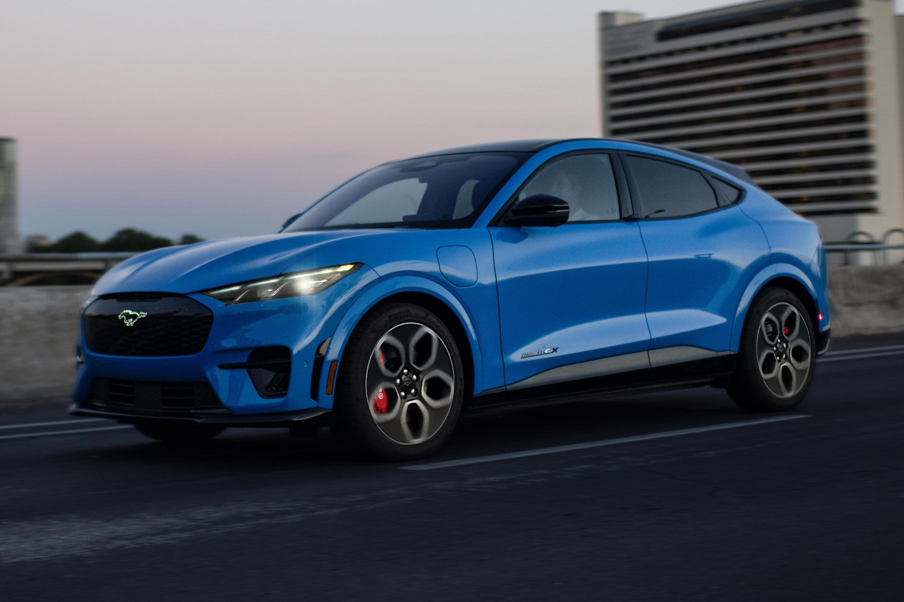 android, ford mustang mach-e guns for tesla model y with more range, torque