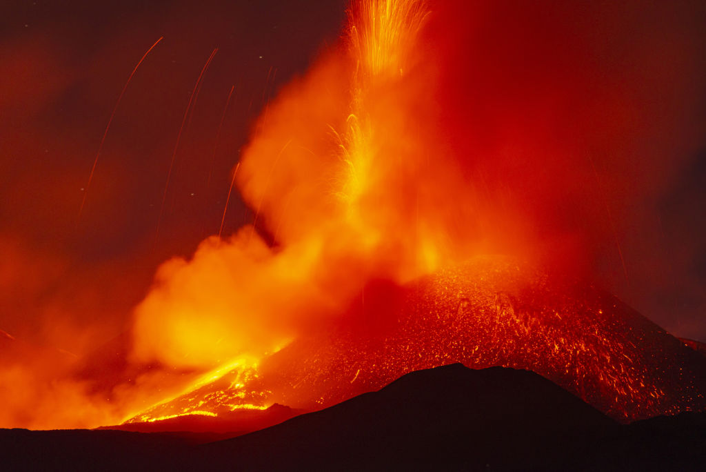 <p>Mt. Etna in Catania, Italy, is seen erupting on May 21, 2021. After a month and a half of apparent rest, volcanic activity resumed strongly on the volcano, with a spectacular lava fountain at the southeast crater 48 hours after the last eruption.</p>