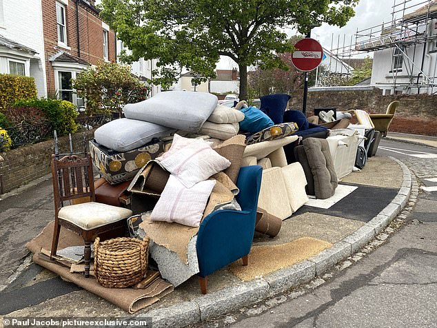 families face horrendous clean-up after high tide flooded their homes - turning gardens into swimming pools and writing off 15 cars
