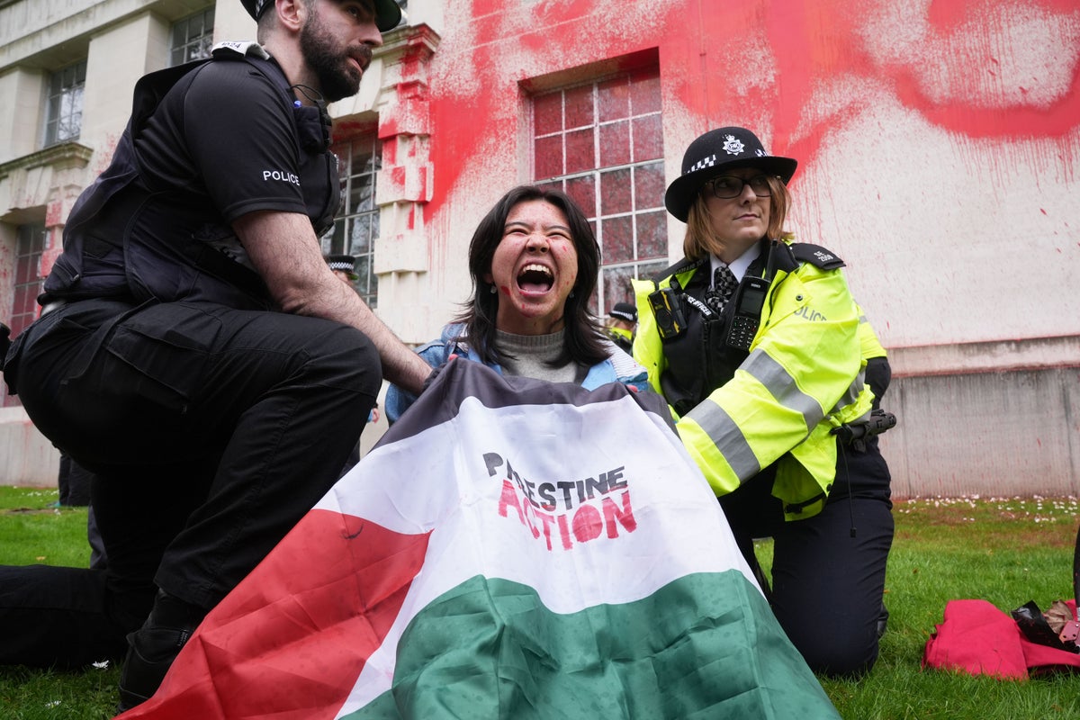 pro-palestine protesters spray red paint over ministry of defence building