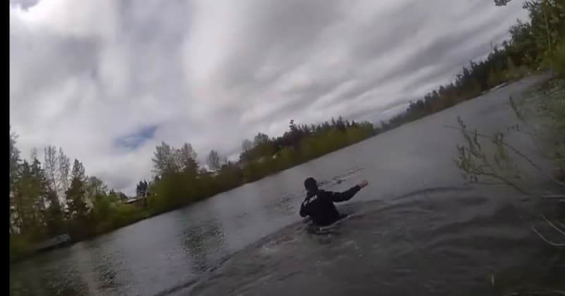 Dramatic Footage Shows Police Officer Who's Not 'That Good of a Swimmer ...