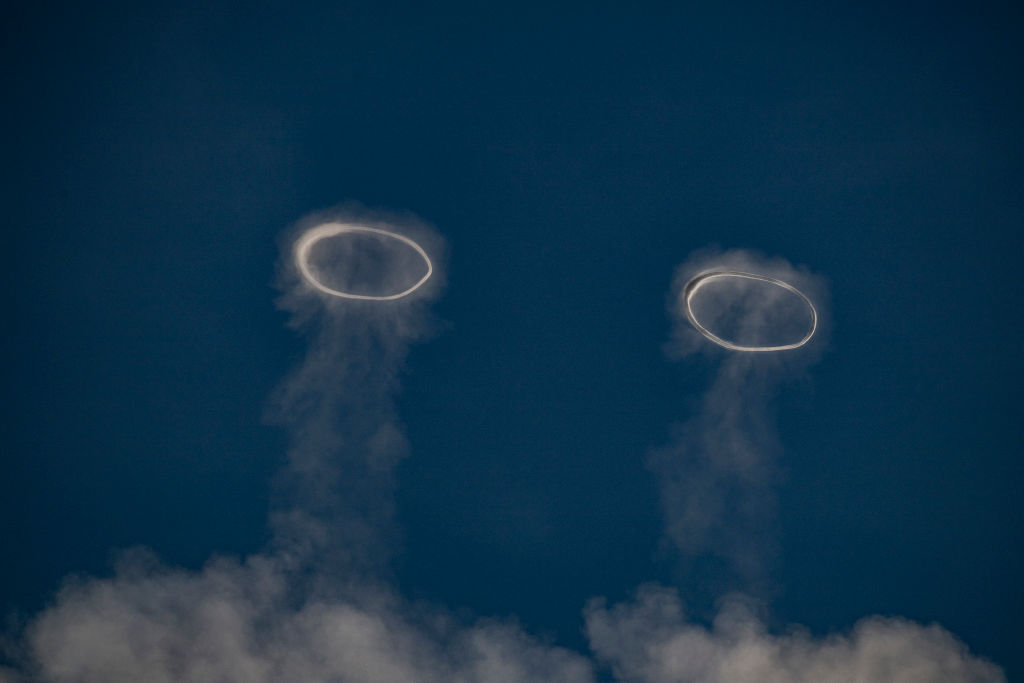 <p>Two steam rings called volcanic vortex rings are seen above Mt. Etna, a volcano in Catania, Italy, on April 6, 2024. </p><p>"The eruptive history of the volcano can be traced back 500,000 years and at least 2,700 years of this activity has been documented," according to UNESCO's World Heritage <a href="https://whc.unesco.org/en/list/1427/">listing</a> for Etna.</p>