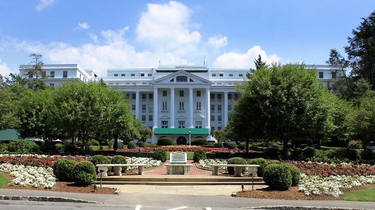 <p>Dubbed ‘America’s Resort,’ The Greenbrier is an all-in-one destination with a casino, golf course, and even a bunker tour from its days as a Cold War fallout shelter. With over 200 years of history and rooms that radiate luxury, it’s a lavish step back in time.</p>