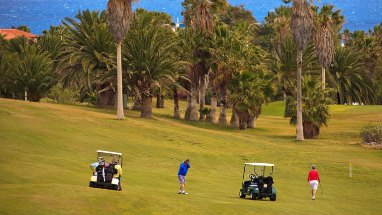 Golfers in Tenerife in March 2011. - EyesWideOpen/Getty Images