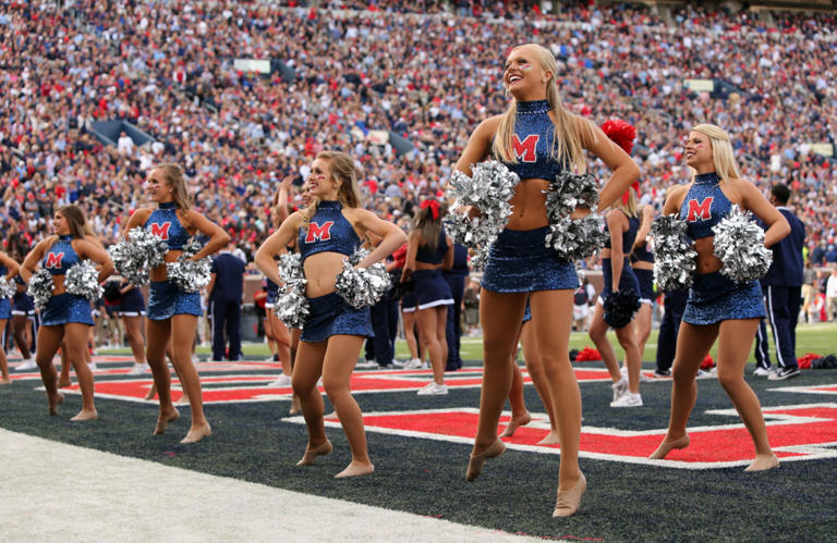 OXFORD, MS - OCTOBER 4: Cheerleaders of the Ole Miss Rebels entertain the crowd during a timeout against the Alabama Crimson Tide on October 4, 2014 at Vaught-Hemingway Stadium in Oxford, Mississippi. Mississippi beat Alabama 23-17. (Photo by Joe Murphy/Getty Images)