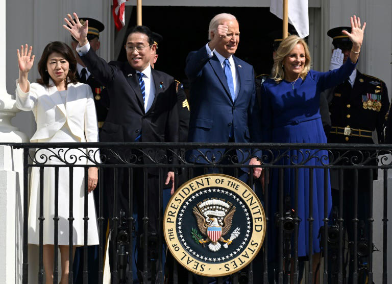 (L-R) Yuko Kishida, her husband Japanese Prime Minister Fumio Kishida, US President Joe Biden and First Lady Jill Biden wave from the Truman Balcony during an Official Arrival Ceremony on the South Lawn of the White House in Washington, DC, April 10, 2024.