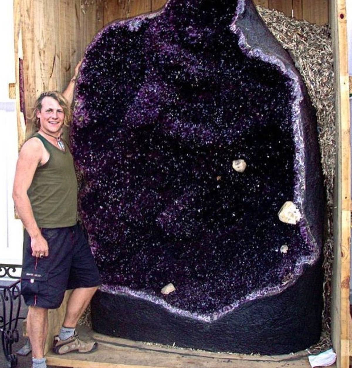<p>This massive amethyst straight-up looks like the portal to the Nether in <i>Minecraft</i>. I had no idea that quartz rocks could be this big. </p> <p>Everything else aside, the purple color of this is <i>beautiful</i>. </p>