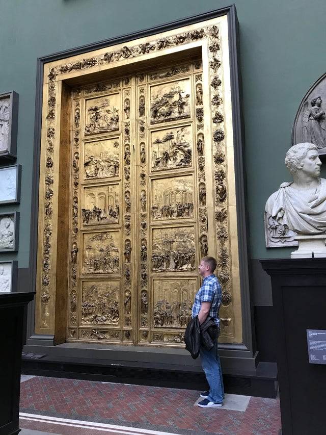<p>This is a 6 foot 1 man standing next to a massive door in the Victoria & Albert Museum in London, England. Apparently, Michelangelo called them the doors of paradise.</p> <p>What was the human race's obsession with making such large doors, especially because we're clearly so tiny in this world?</p>