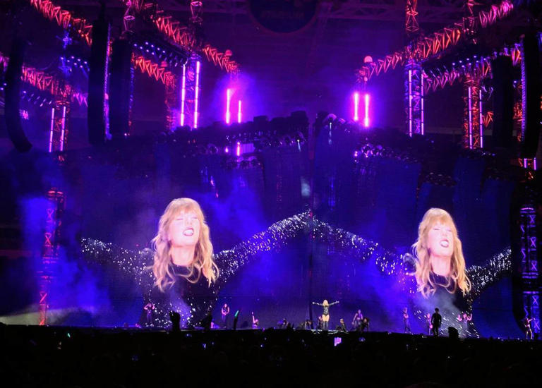 Taylor Swift performing at a packed Hard Rock Stadium in Miami Gardens on her Reputation Tour on Aug. 18, 2019.