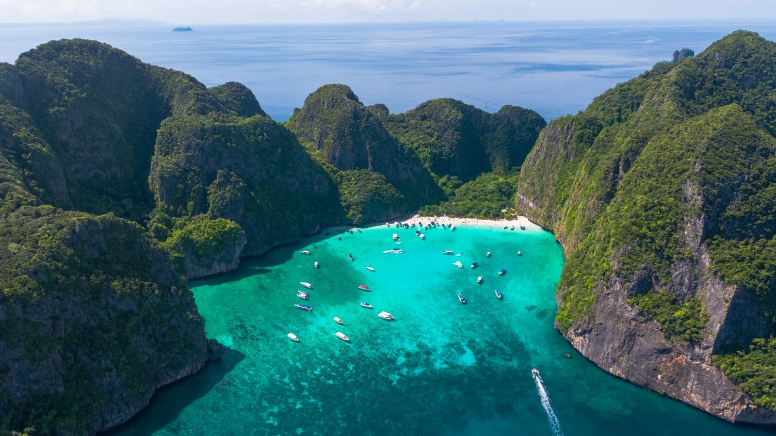 <p class="wp-caption-text">Image Credit: Shutterstock / Drone Thailand</p>  <p>Thailand’s warm hospitality, pristine beaches, and ornate temples create a paradise for travelers. The bustling markets, tranquil islands, and delicious street food offer an unforgettable experience.</p>