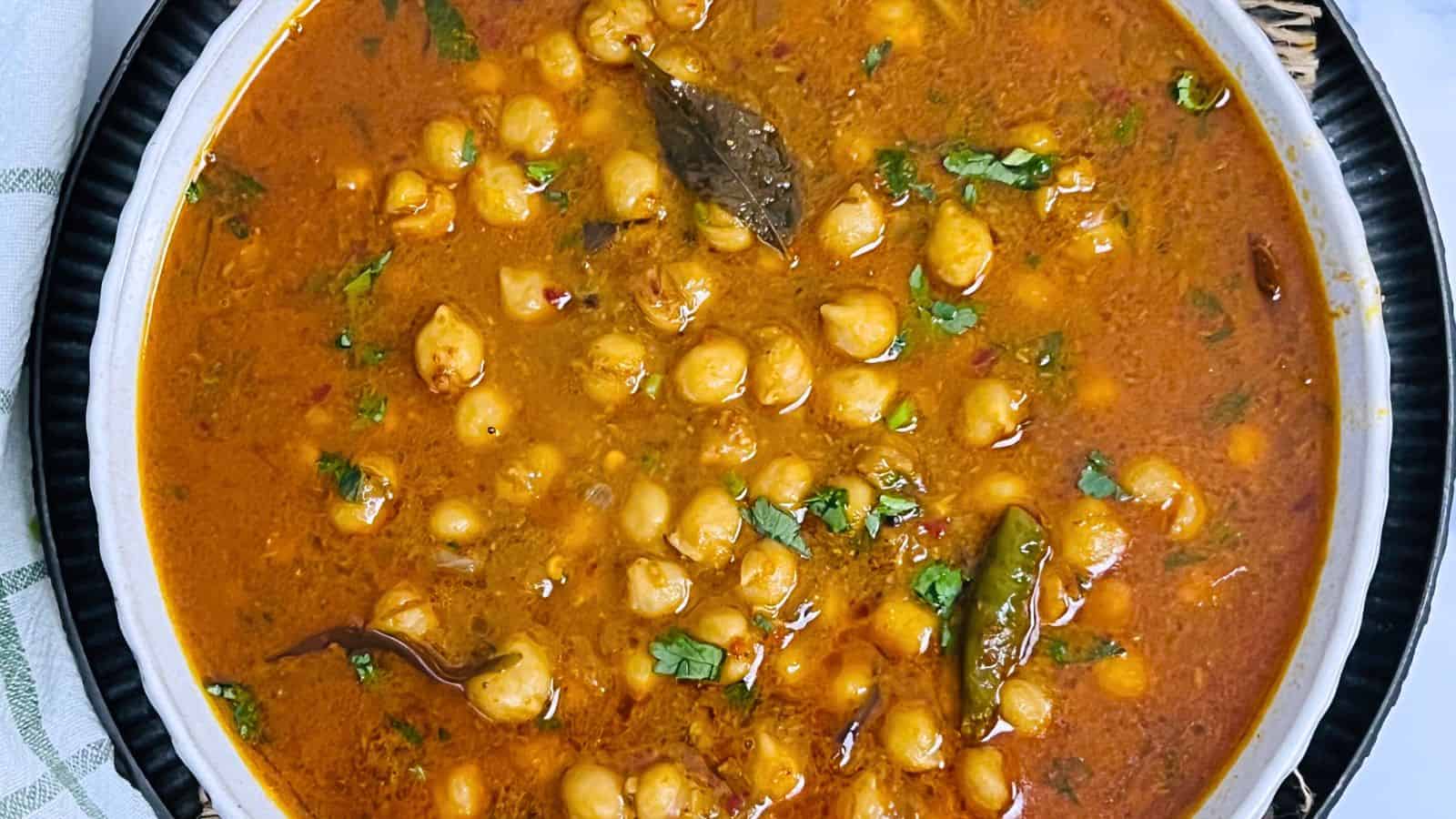 <p>Dig into the heart of Southern Indian cuisine with this Chana Masala. It's a vegetarian delight that pairs perfectly with your favorite flatbread or rice. This is comfort food made for every palate, vegan or otherwise.<br><strong>Get the Recipe: </strong><a href="https://easyindiancookbook.com/south-indian-chana-masala/?utm_source=msn&utm_medium=page&utm_campaign=msn">South Indian Chana Masala</a></p>