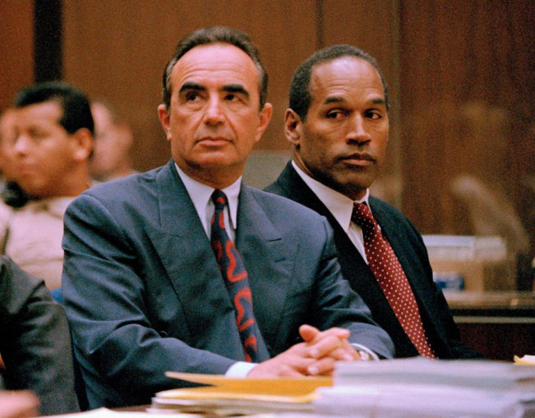 O. J. Simpson (R) appears with his attorney Robert Shapiro in Los Angeles County Superior Court for his preliminary hearing in Los Angeles, June 30, 1994.