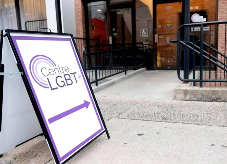 Purple and white centre lgbt+ sign